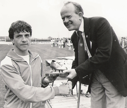 David Edgar receives the Golden Boot from Willie Hunter