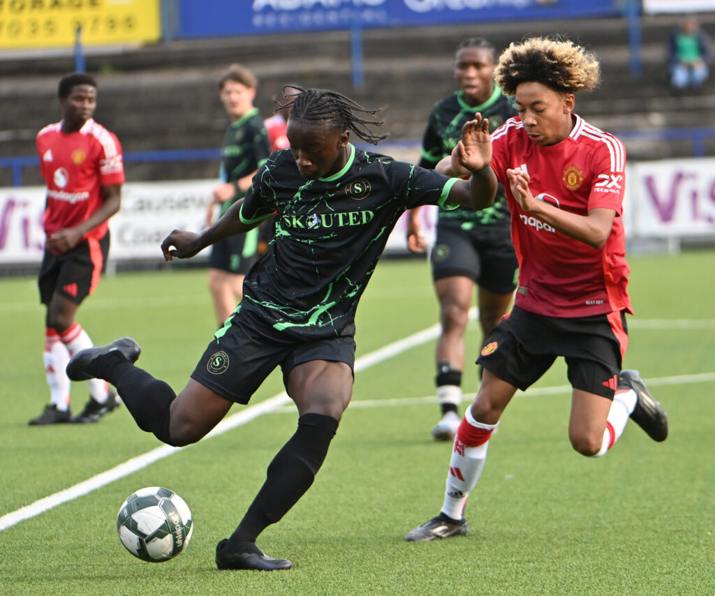 23rd July 2024
Press Eye - Belfast - Northern Ireland -
2024 SuperCupNI Premier section match between Manchester United and Skouted FC at Coleraine Showgrounds.
Uniteds Noah Ajayi in action with Skouted’s Ritchy Biyekele
Picture by - Stephen Hamilton -Presseye