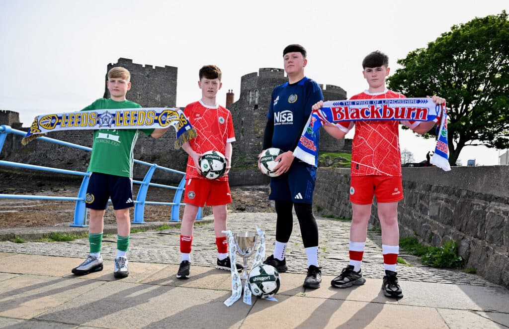 Kylan Morrison and Carter McAllister (Shankill Juniors) line up with Keagan O’Connor and Ronan Vernon (Cliftonville) ahead of the 2025 Budget Energy SuperCupNI. They’ll compete in a world-class Boys’ Minor Section featuring Leeds United and Blackburn Rovers, alongside top clubs from Northern Ireland, USA, Scotland, Bermuda and the UAE.