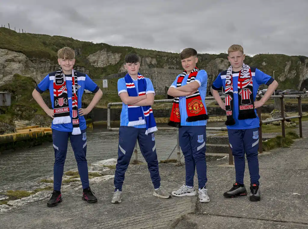 Ballymena United 2013s players Cole Logan, Curtis McKeown, Mason Buxton and William Shannon are pictured at Ballintoy Harbour as the Budget Energy SuperCupNI confirms its 2026 Boys’ Premier Section line-up, featuring Manchester United, Sunderland, Rangers and reigning champions Southampton.